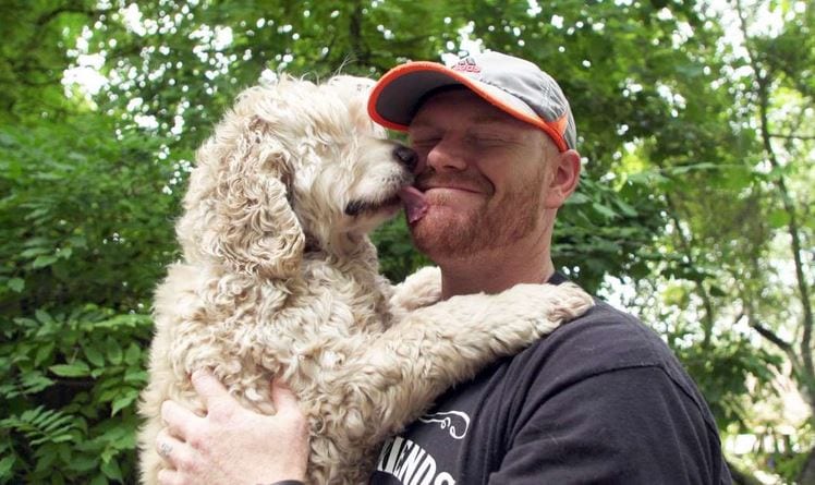 Mason Taylor with Mack the dog at Old Friends Senior Dog Sanctuary in Tennessee. 