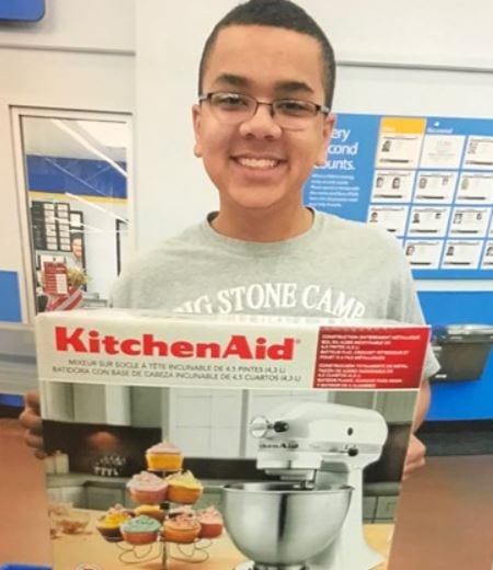 Isaiah Tuckett with his newly-purchased KitchenAid mixer. 