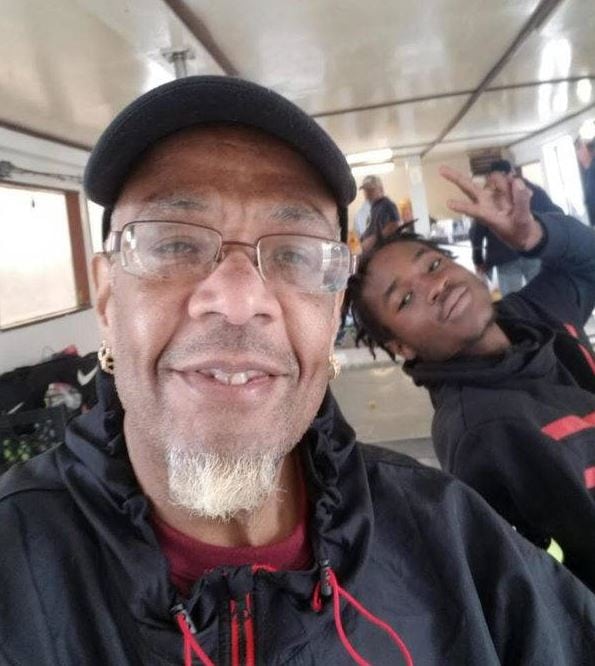 Guy Bryant with one of his foster kids on the way to go fishing. Photo courtesy G. Bryant.