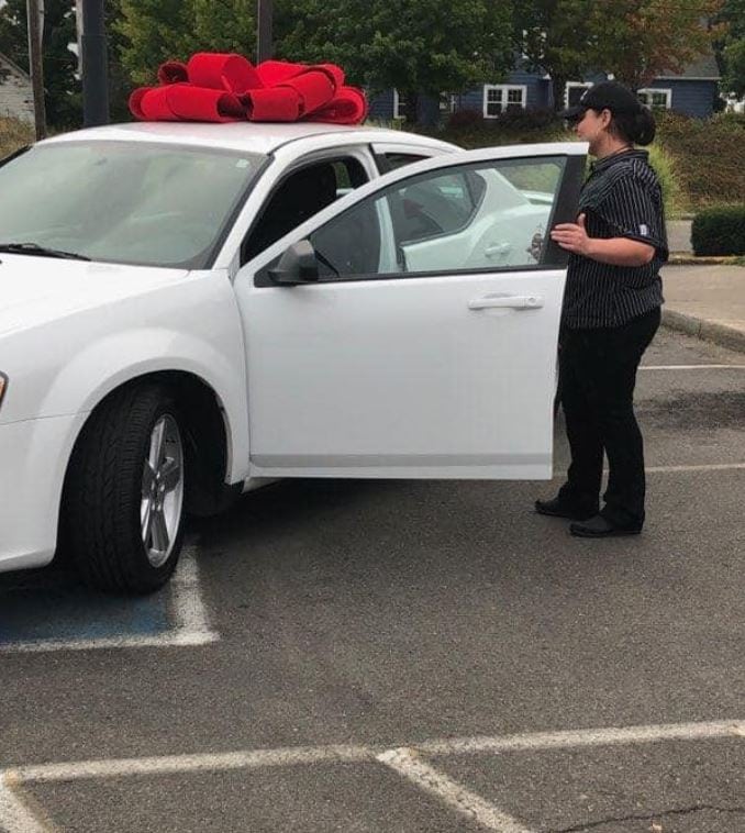 KFC surprises single mom with a new car after she walked an hour to and from work every day for a year. Credit: Crystal Lachance