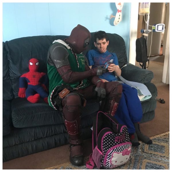 This police officer spends his free time giving to the homeless and hospitalized children dressed as a superhero.