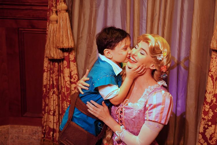 Boy with autism who’s usually shy, completely opens up and has the sweetest reactions around Disney princesses.