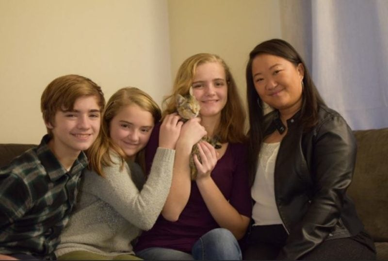 Blind kitten who was abandoned in a pile of trash, finds her fur-ever home with a family of adopted kids.