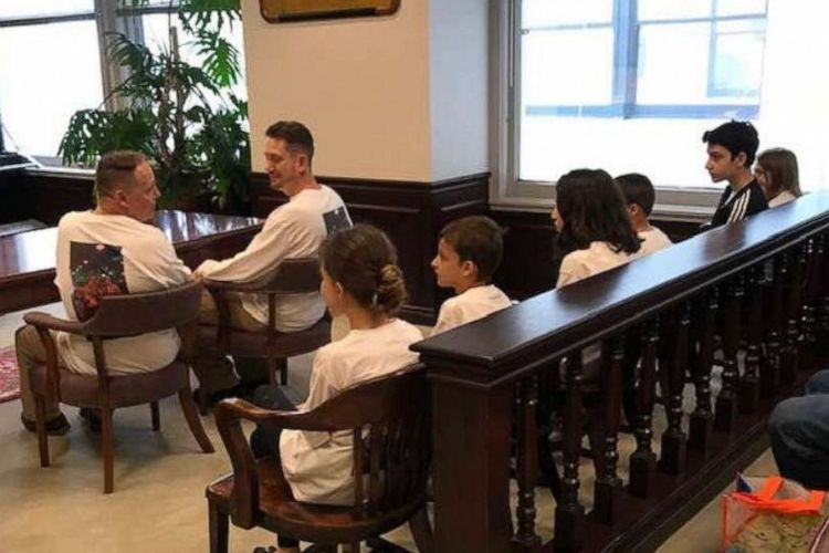 Two dads adopt 6 siblings who spent 5 years in foster care just so they could stay together.