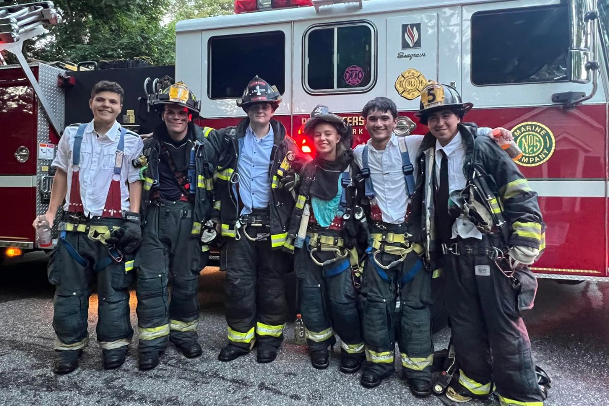 Six volunteer firefighters leave high school graduation to put out house fire. (Port Jefferson Fire Dept.)