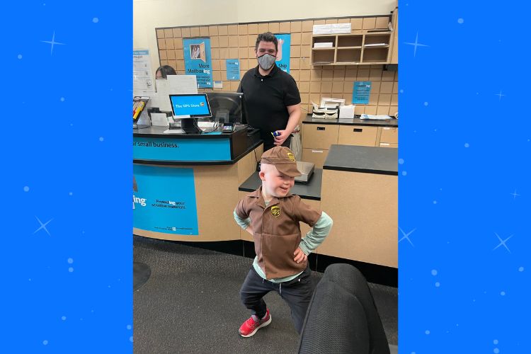 Drew entertaining the employees at the UPS store. (Becky Bausman).