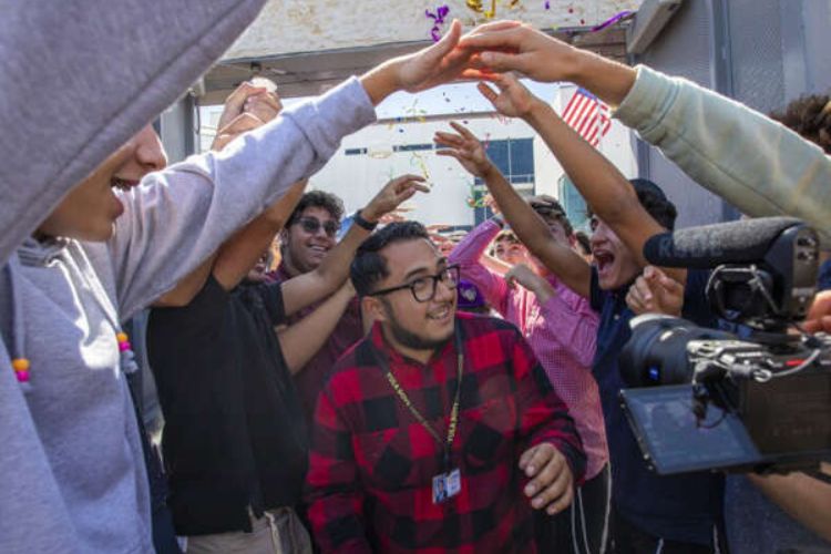 Car-less math teacher, who commutes 4 hours to work every day, gets surprised with new car by students (Emily Rahhal/Patch)