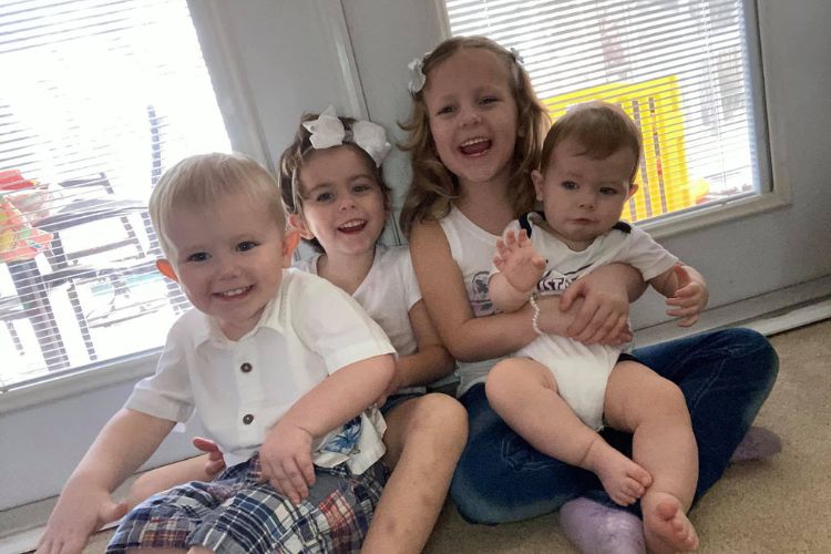 After fostering over 50 kids in 6 years, mom adopts 4 siblings to keep them together. (Melissa Servetz)