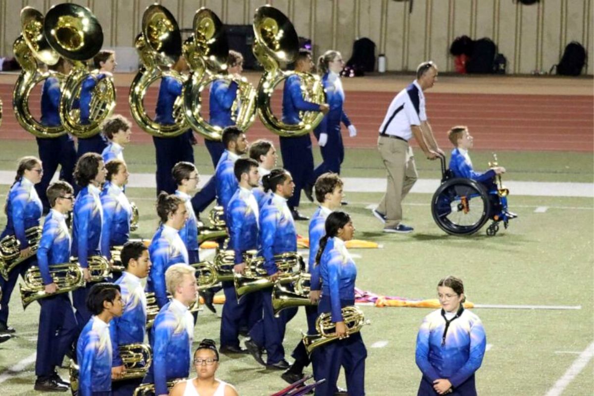 High school band director helps student in wheelchair live his marching band dreams