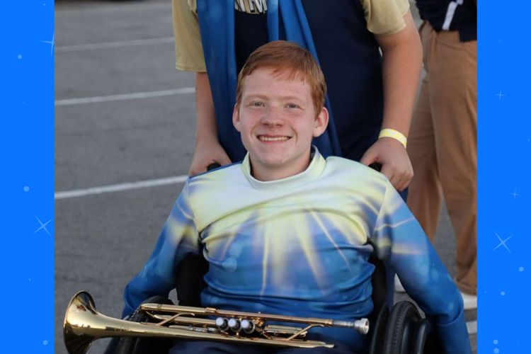 High school band director helps student in wheelchair live his marching band dreams. (David Anderson)